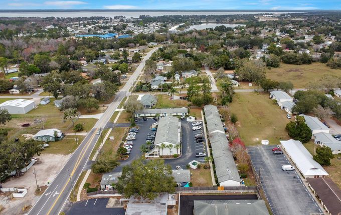 An aerial view of a small town with a lot of houses and trees.
