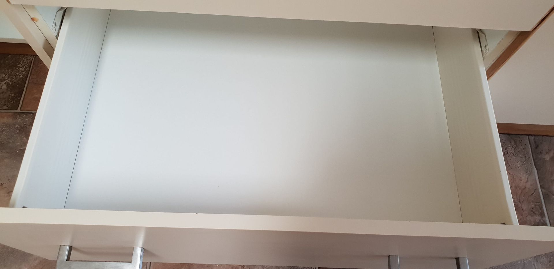 A White Drawer is Empty in a Kitchen — Lease Clean Newcastle in Newcastle, NSW