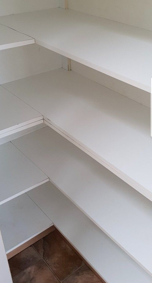 A Closet With Empty Shelves and a Wooden Floor — Lease Clean Newcastle in Newcastle, NSW