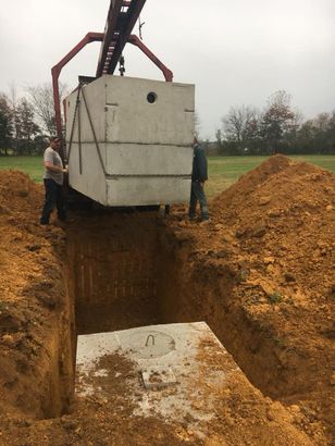 A-1 Pumping and Drain Cleaning in Dalton GA installing new septic tanks