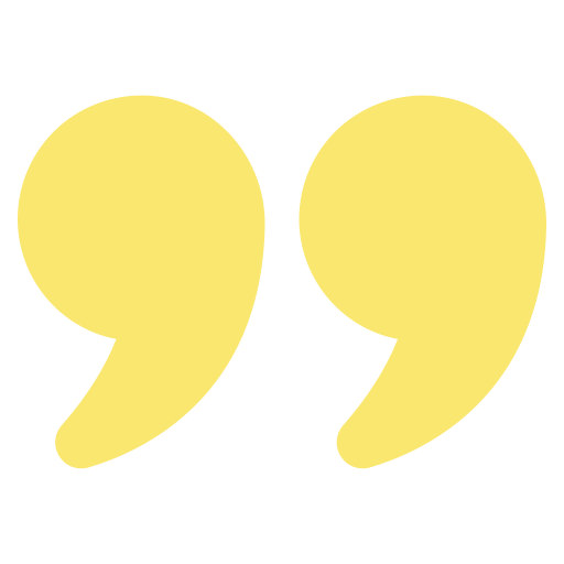 A pair of yellow quotation marks on a white background.