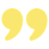 A pair of yellow quotation marks on a white background.