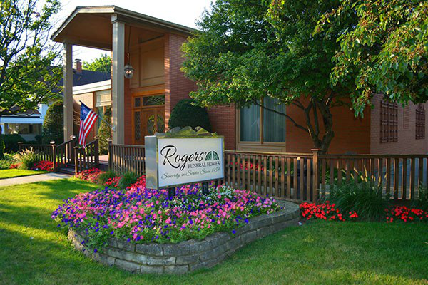 A house with a sign that says rogers on it