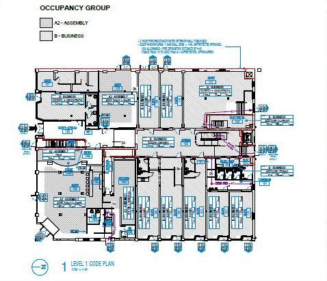 Floor plan marked with assembly and business occupancy groups.