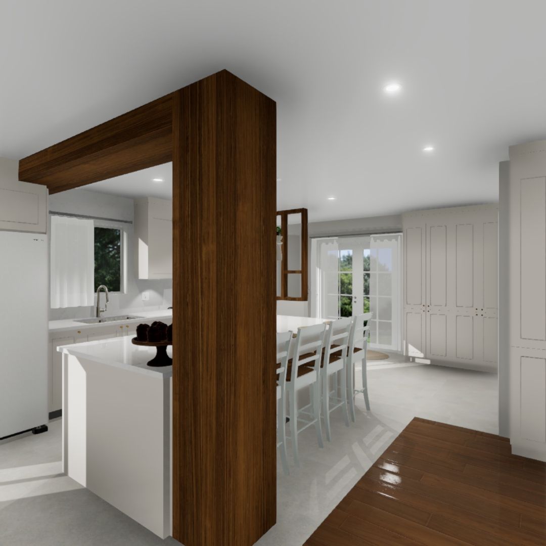 Une cuisine avec des armoires blanches et un pilier en bois