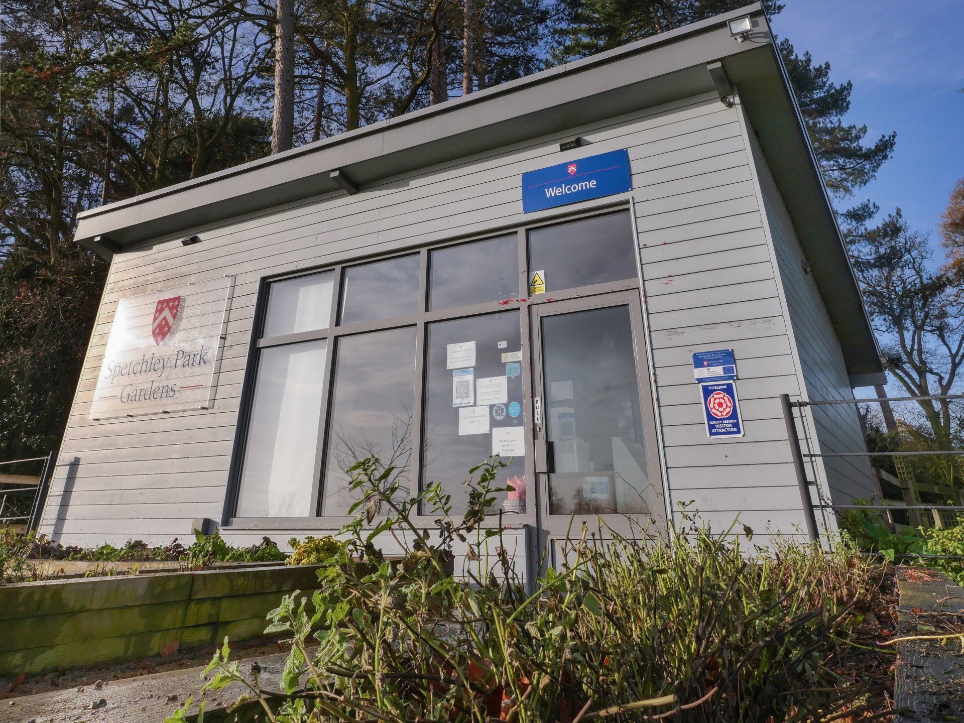 A small building with a sign that says ' ambulance ' on it