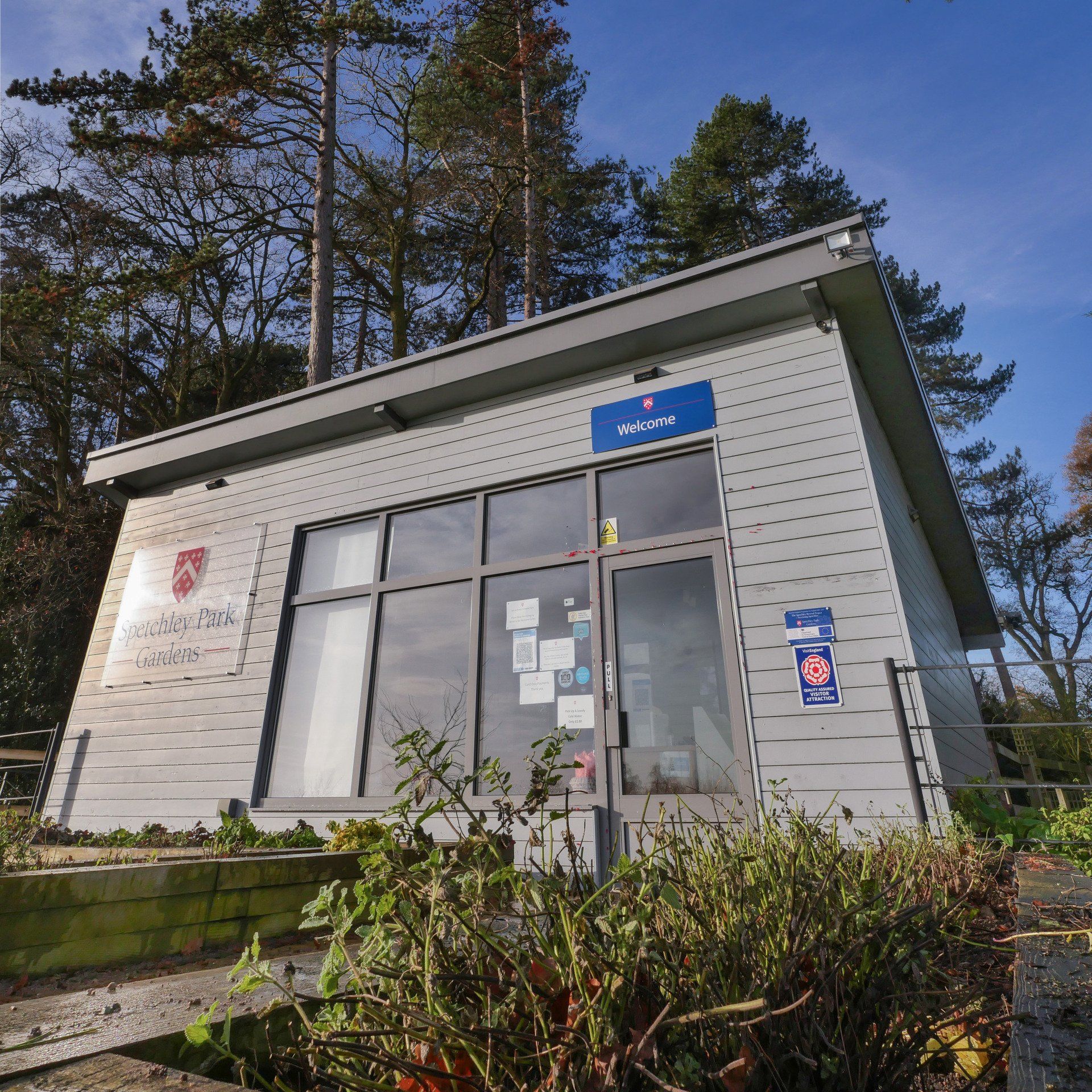 A small building with a sign that says ' a ' on it
