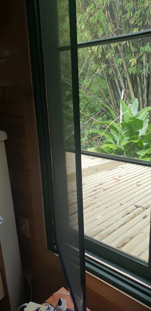 A Window With a Fly Screen on It — North Coast Screens & Repairs in Byron Bay, NSW