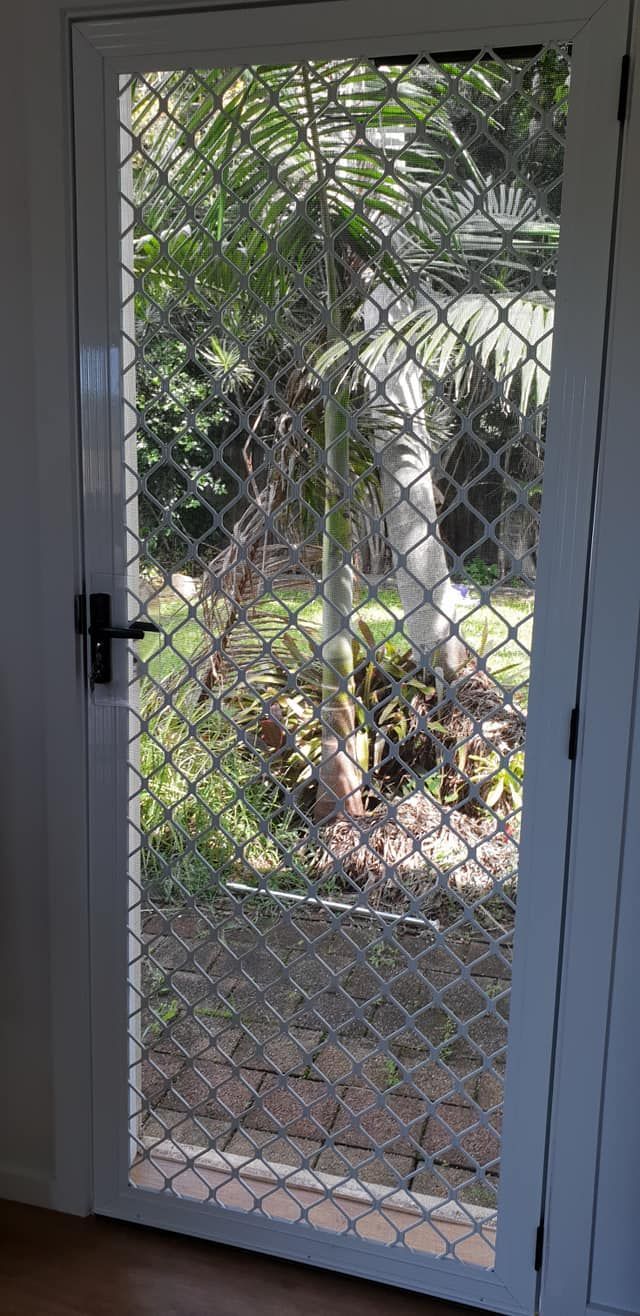 A White Door With a White Screen on It — North Coast Screens & Repairs in Alstonville, NSW
