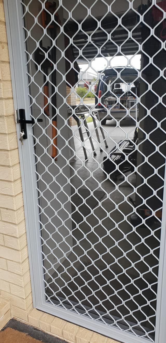 A White Mesh Screen Door — North Coast Screens & Repairs in Lennox Head, NSW