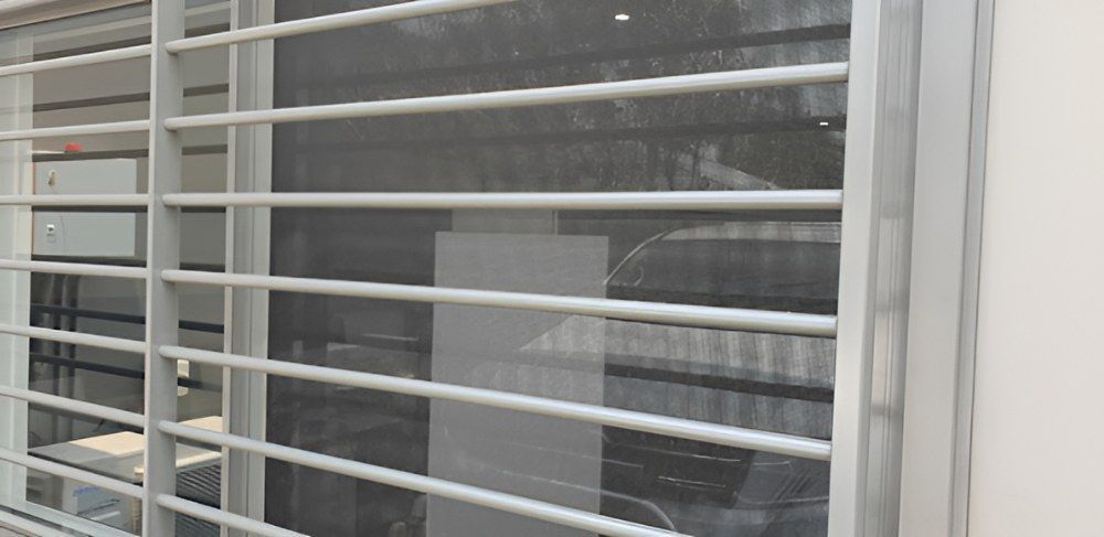 A Close Up of a Window With a Screen on It — North Coast Screens & Repairs in Alstonville, NSW