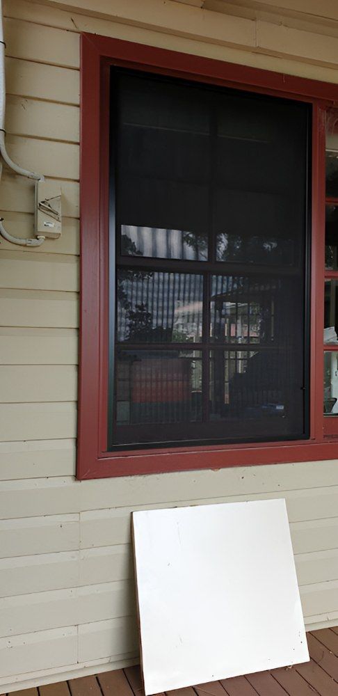 A Window With a Screen on It is on the Side of a House — North Coast Screens & Repairs in Alstonville, NSW