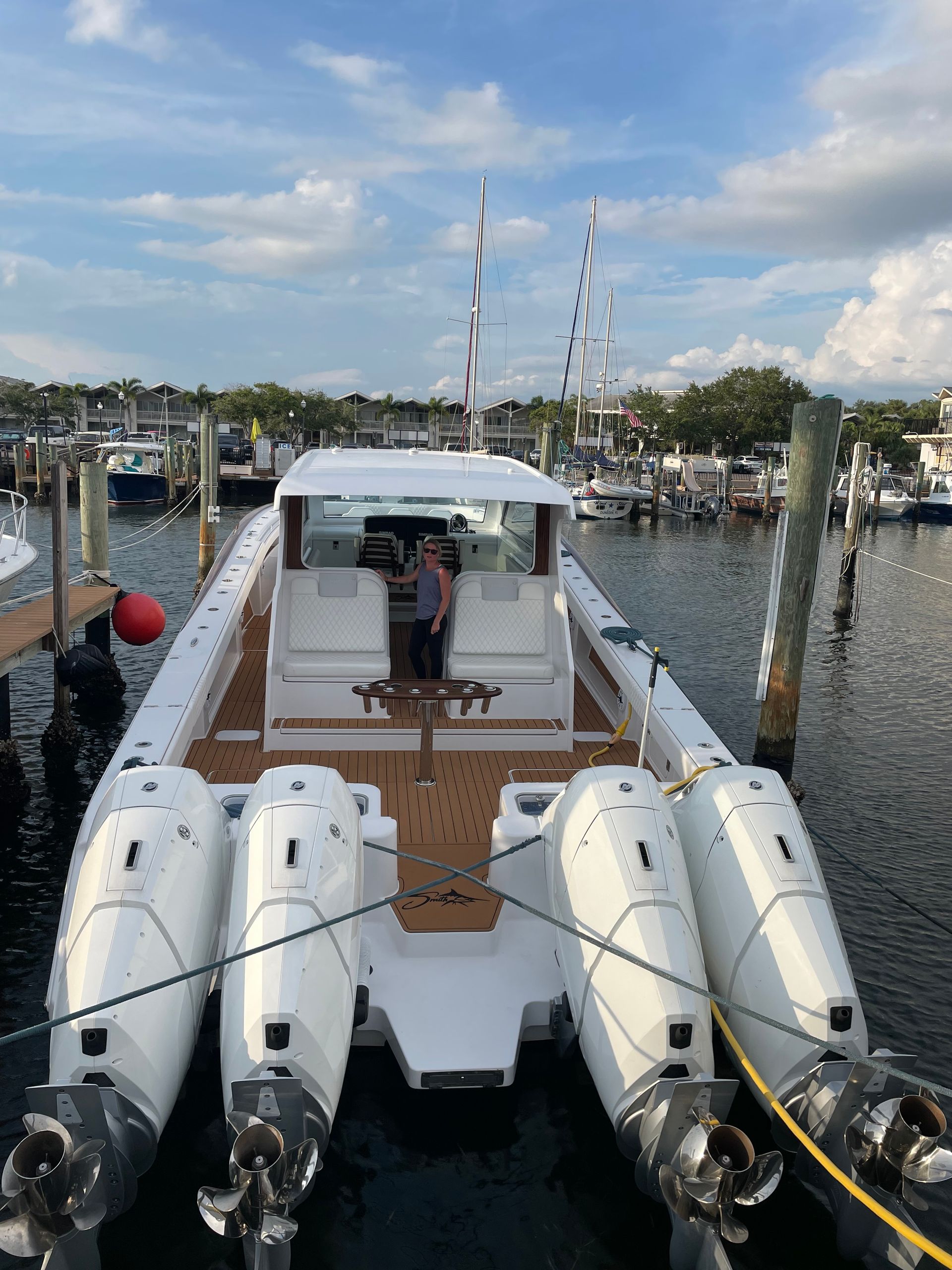 Woman Riding the Large White Boat — Palm Harbor, FL — Ozona Dive Service