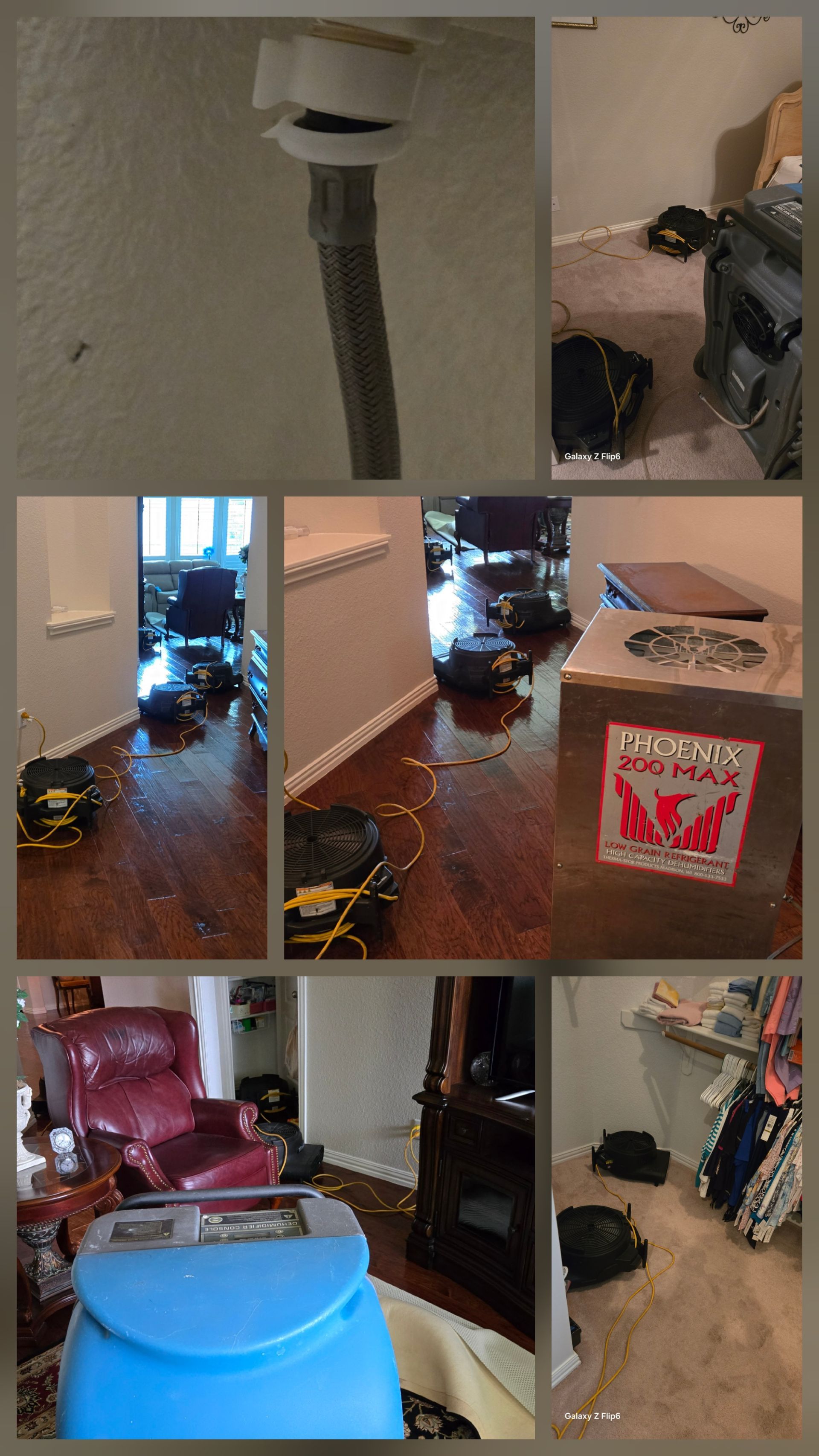 A woman is cleaning a couch with a vacuum cleaner.