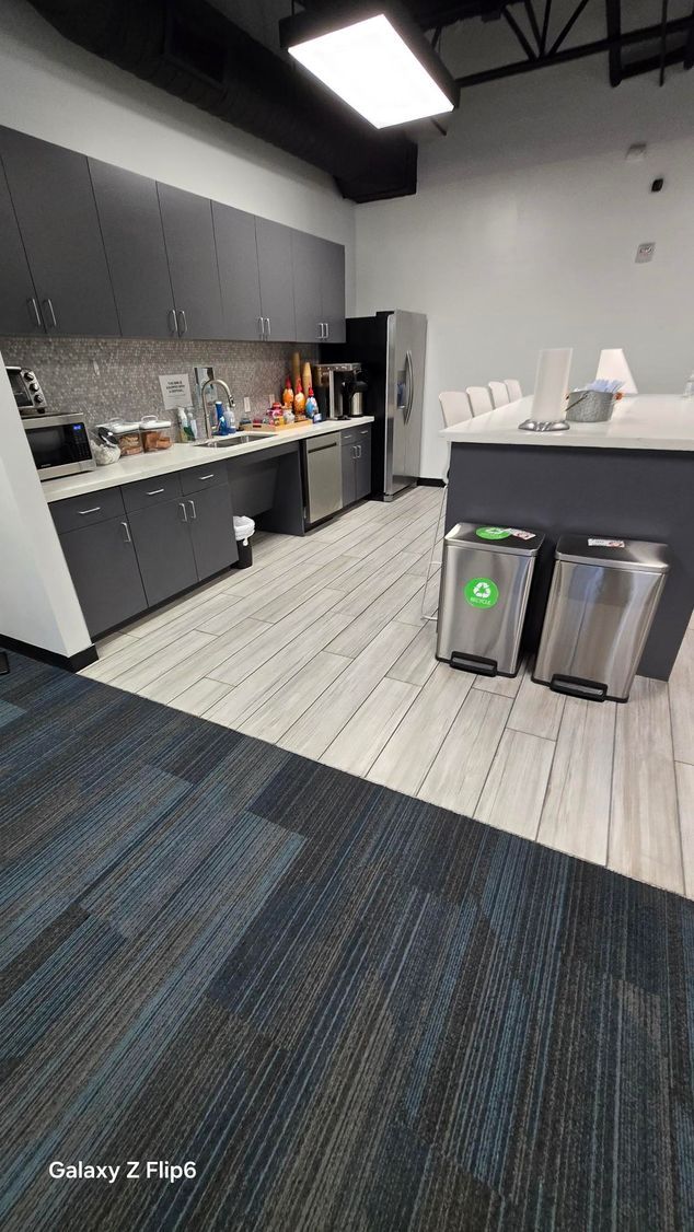 A room with a lot of pieces of wood on the floor and a window.