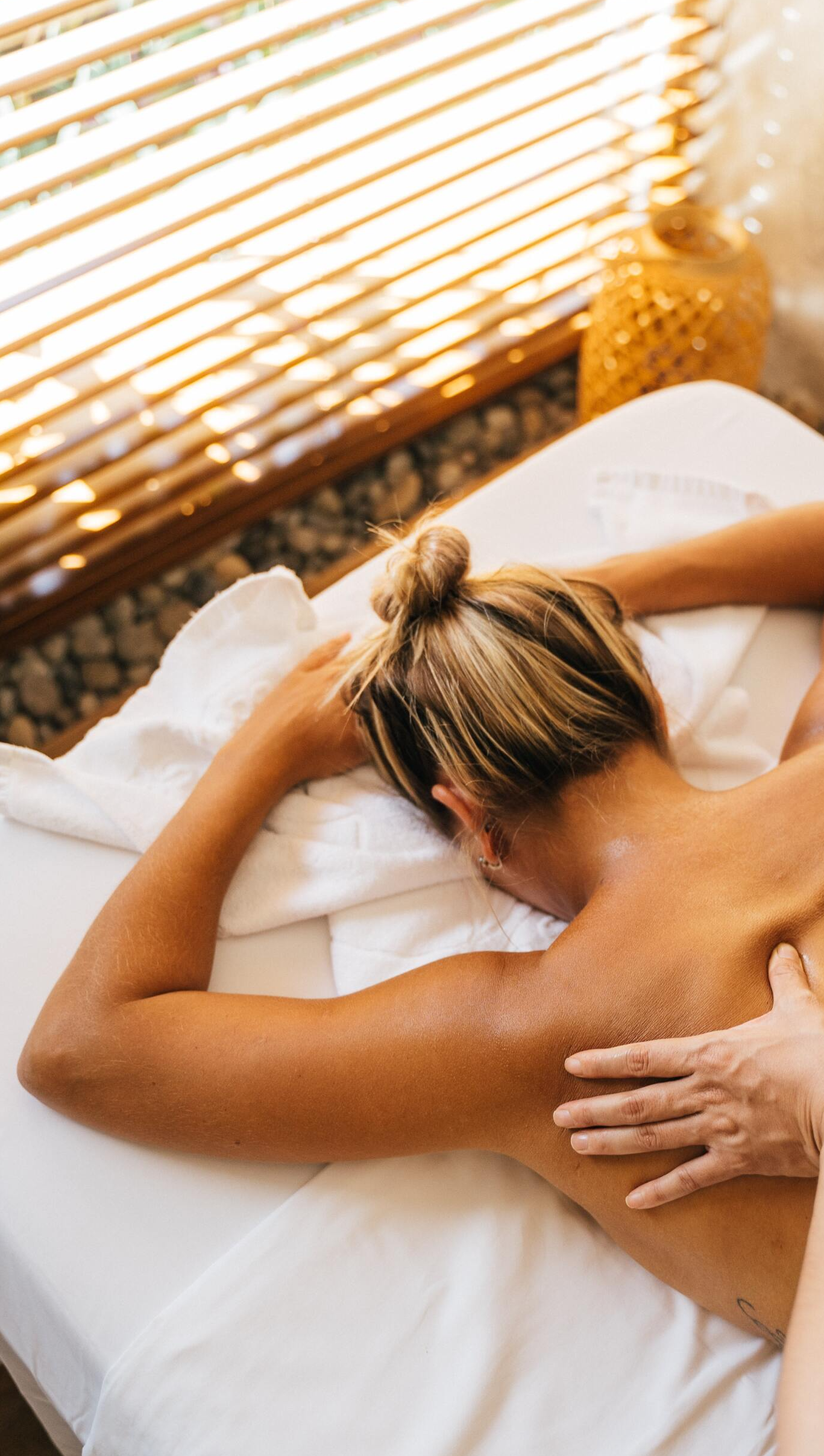woman receiving  temple massage