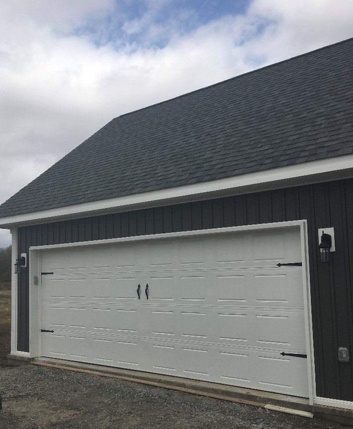 image representing garage door roller replacement