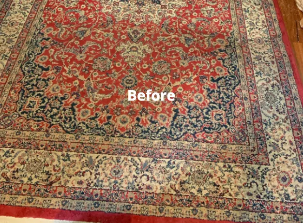 Red and Ivory Oriental Rug With a Dark Blue Border — Dryology Carpet Cleaning in Hamilton, NSW