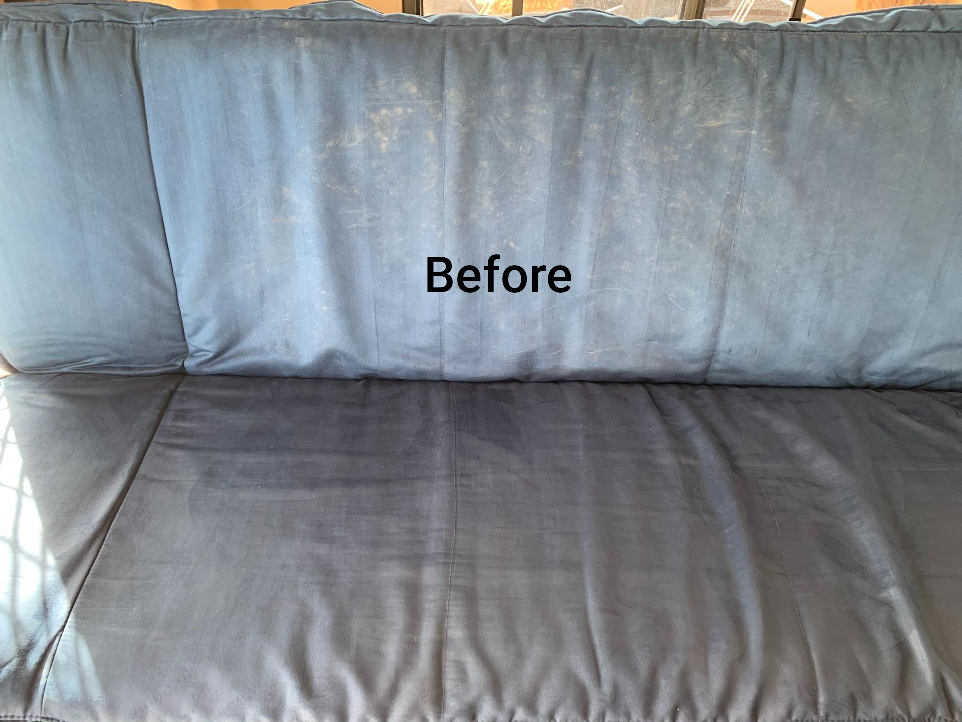 Blue outdoor couch cushions with visible dirt and stains, labeled