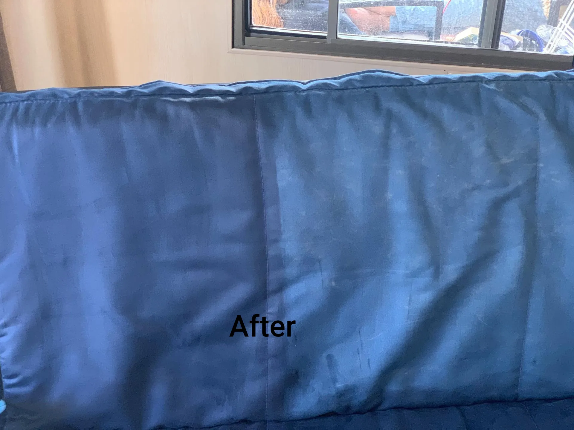Blue Sofa Cushion, the After Cleaned Portion Stands Out — Dryology Carpet Cleaning in Lake Macquarie, NSW