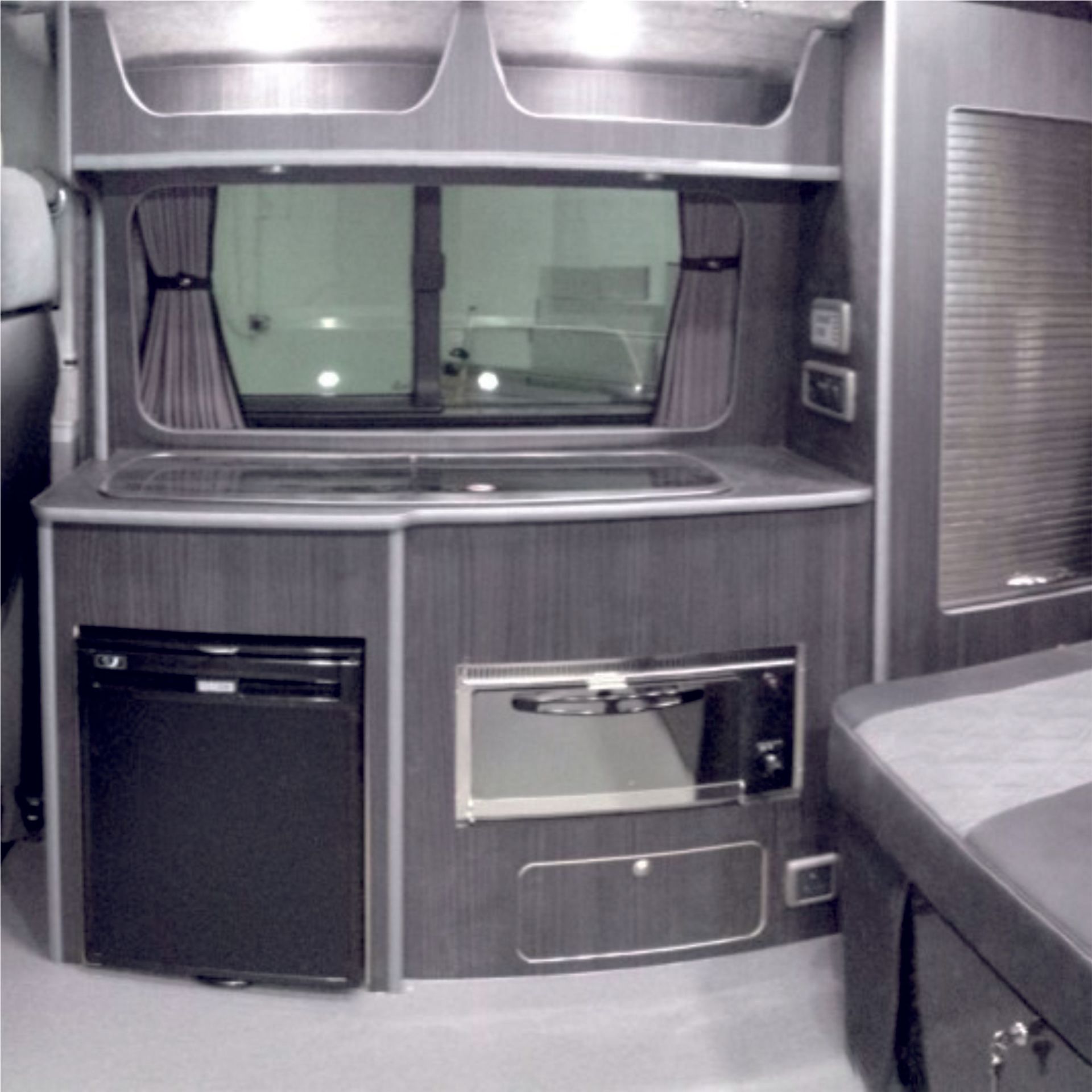 cooker and fridge units installed in a van