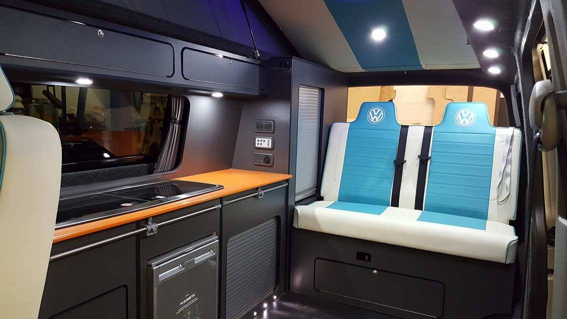 customers van with upholstered seats, custom worktops and bespoke cupboard units