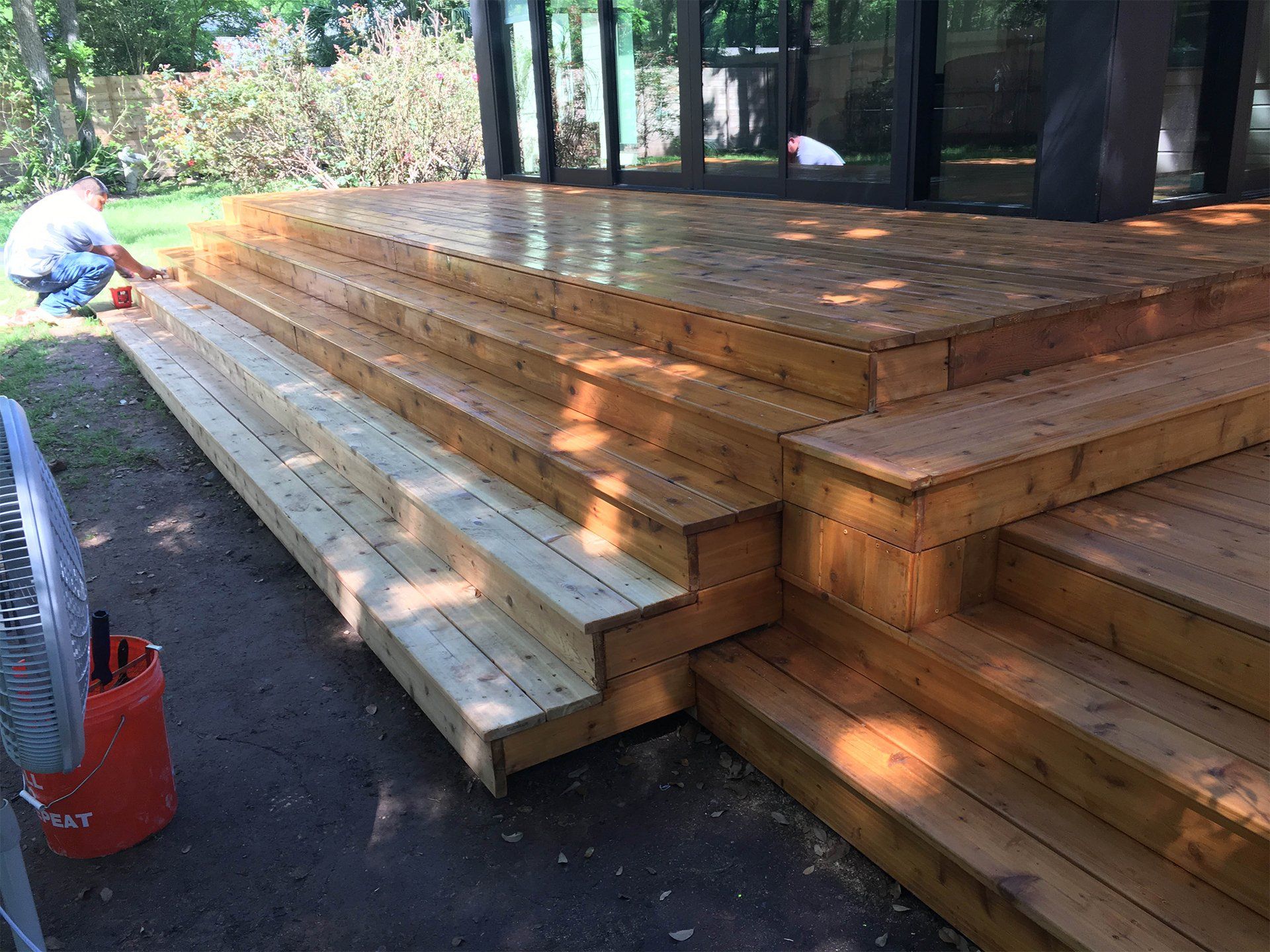 Applying Stain Paint on Wood Deck