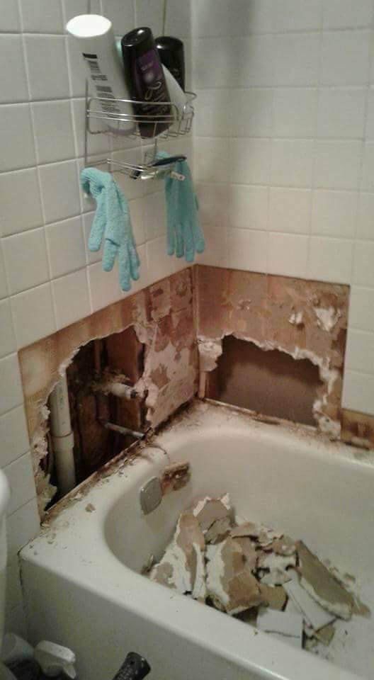 Broken Bathroom Wall