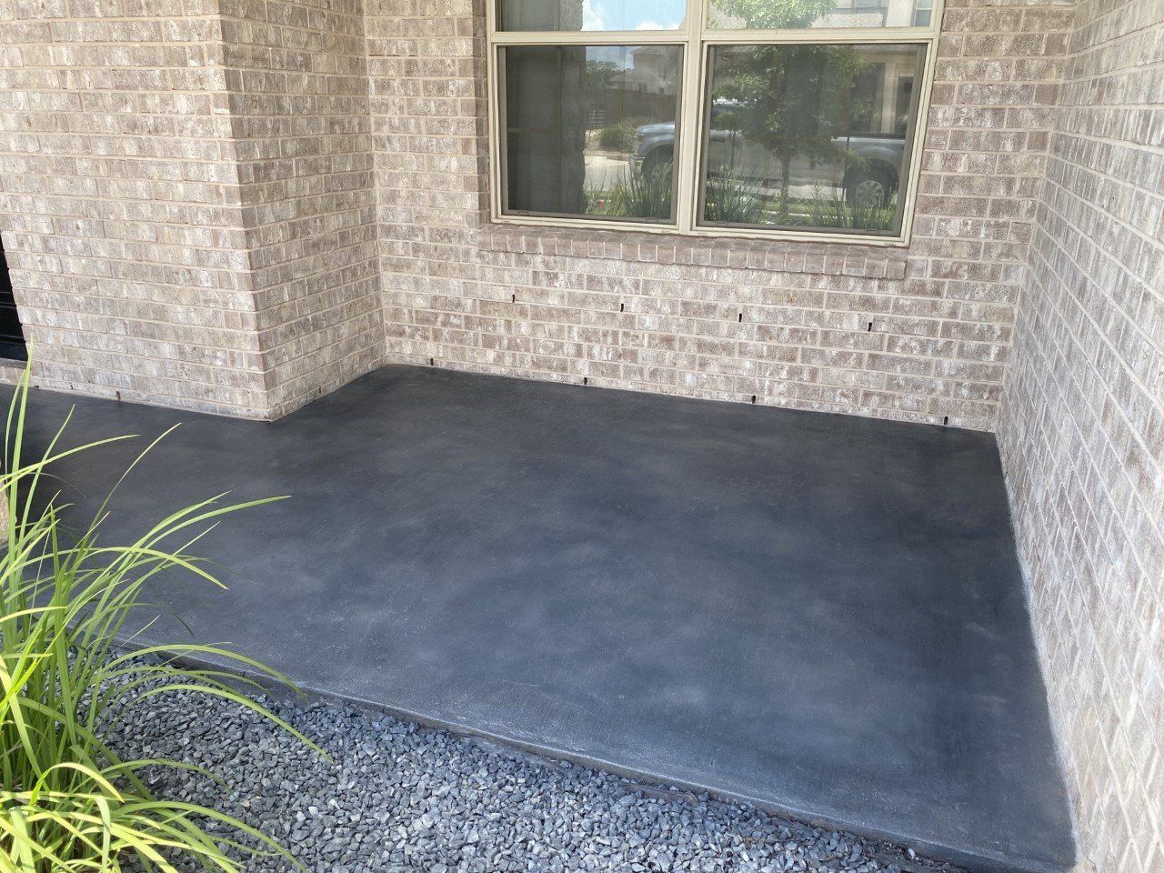 Newly Applied Epoxy on Concrete Porch