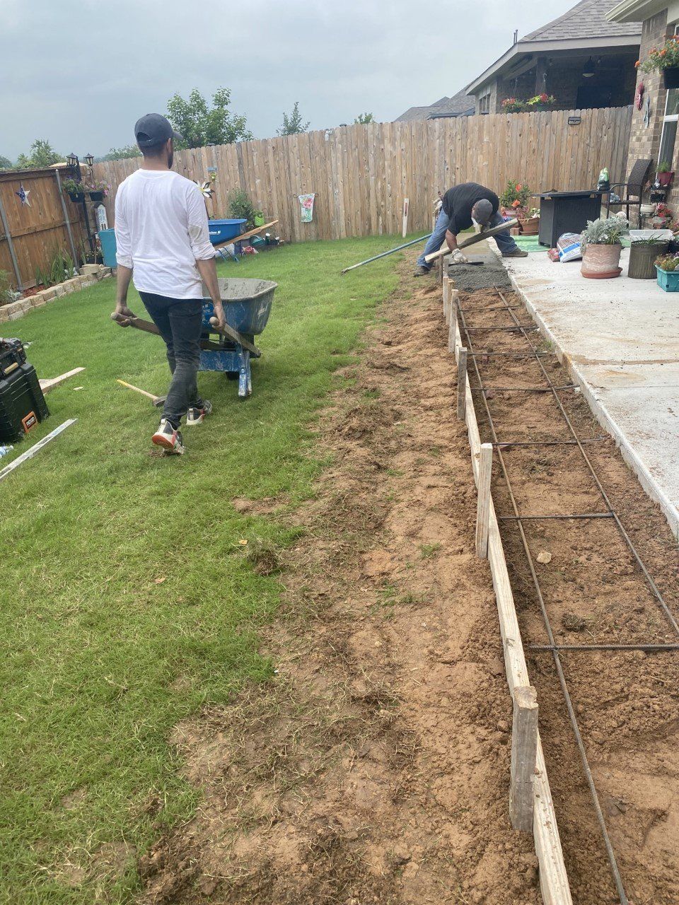Men Working on Concrete Slab