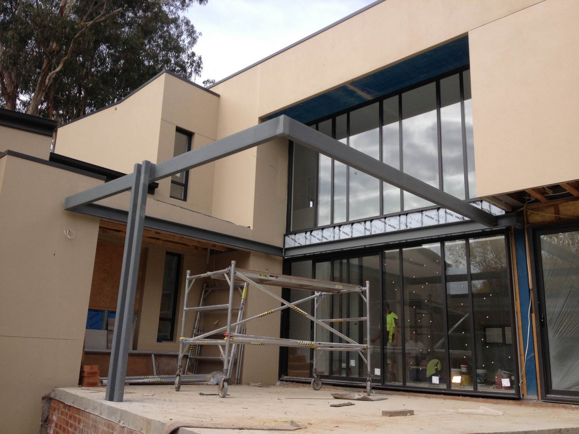 A large building with a scaffolding in front of it