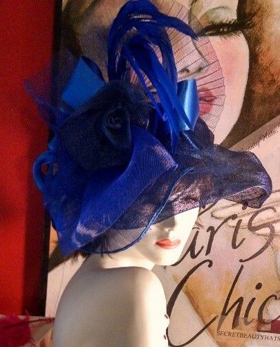 Blue hat on mannequin head, against background with 