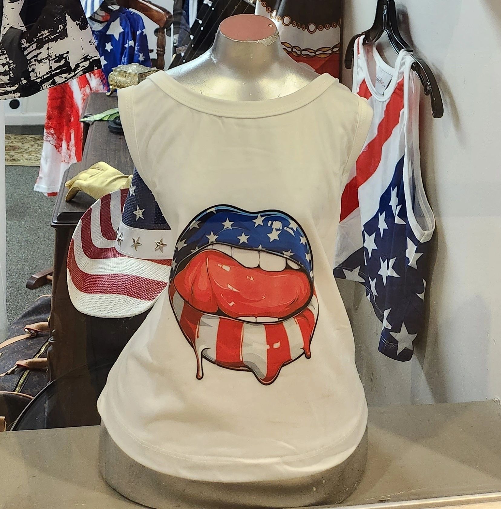 White tank top with American flag lips graphic on a mannequin.