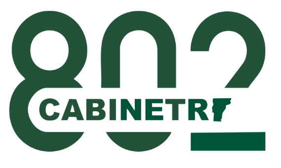 Green and white logo reading “CABINETRY” over stylized numerals “802”