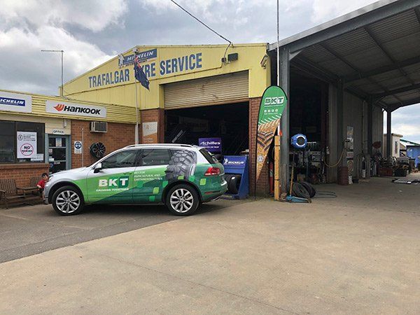 Trafalgar Tyre Service storefront with van