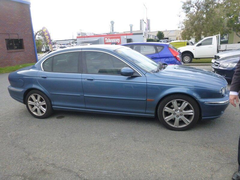 Teal coloured car
