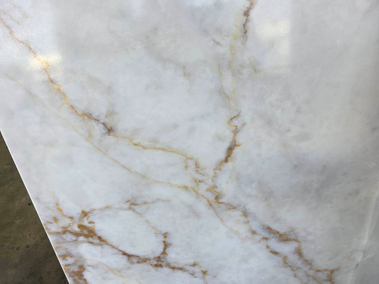 White marble with gold veining.