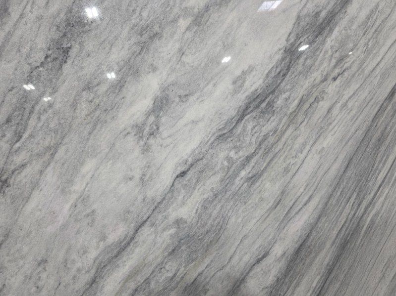 Gray and white marble with diagonal veining.