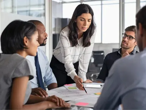 Team discussing employee benefits strategies at work