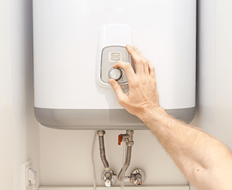 Swimming pool with hot water  — Hot water system element installation in Coffs Harbour