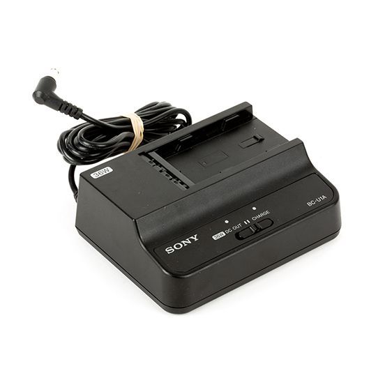 A sony charger with a cord attached to it