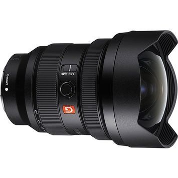 A close up of a camera lens on a white background.