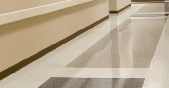 A garage with a concrete floor and white walls.