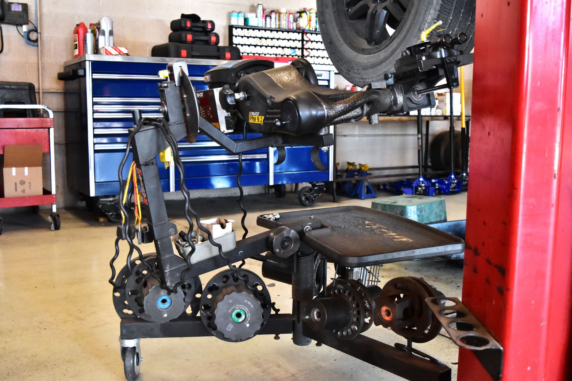 A high-precision brake lathe machine resurfacing a metal rotor to restore a smooth finish 