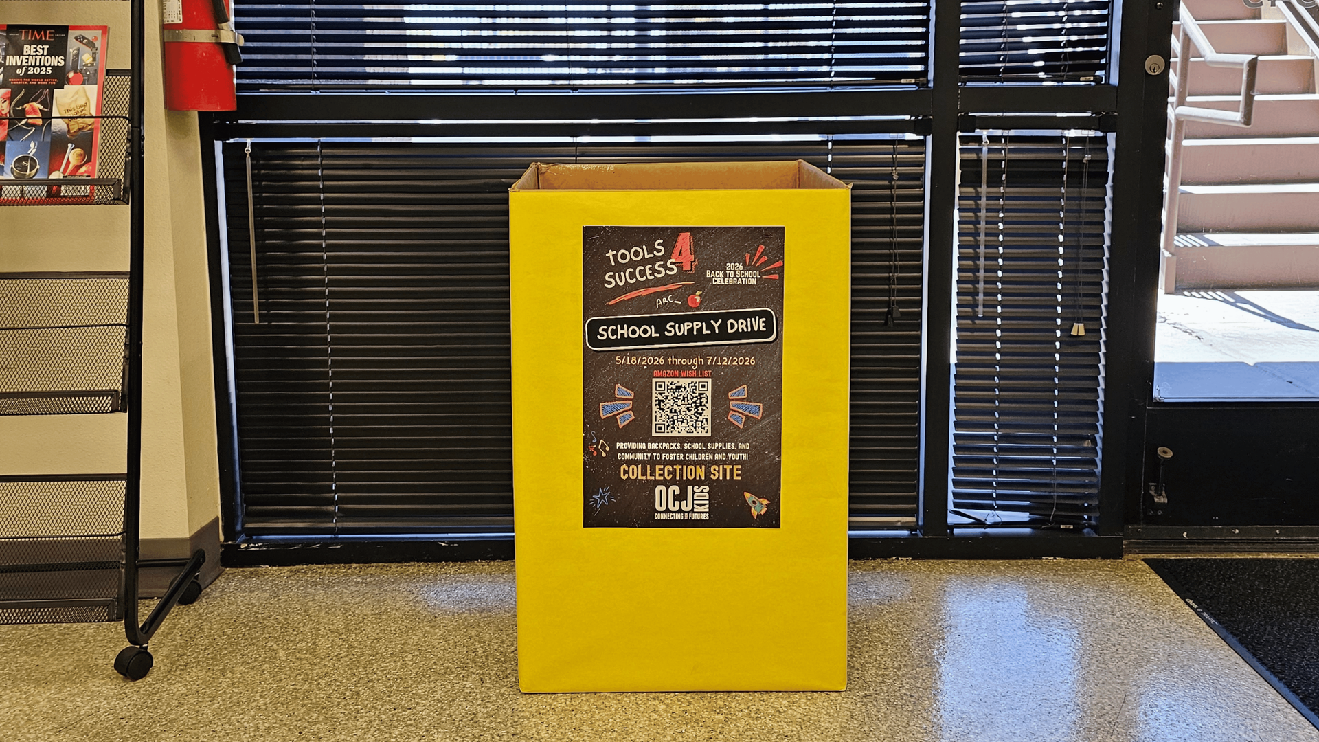 Tools 4 Success school supply donation bin displayed in Phoenix auto repair shop lobby for OCJ Kids