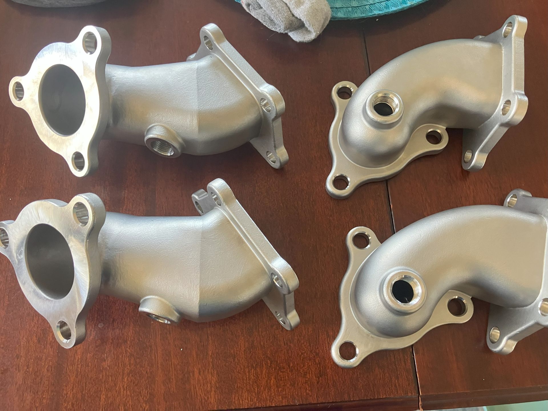 3 Sets of exhaust LFX to LLT exhaust adapters, bolts, gaskets