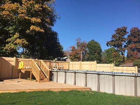 Brown Fence With Stairs - Durhamville, NY - Helmer’s Complete Tree & Landscape