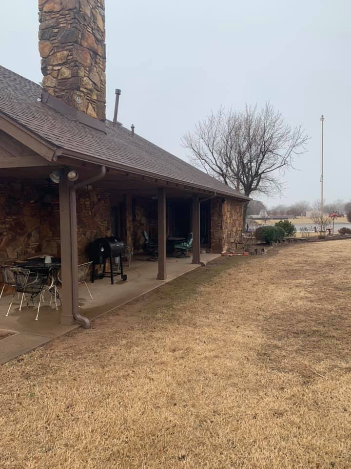 House With Chairs Outside — Oklahoma City, OK — A-Plus Seamless Guttering LLC