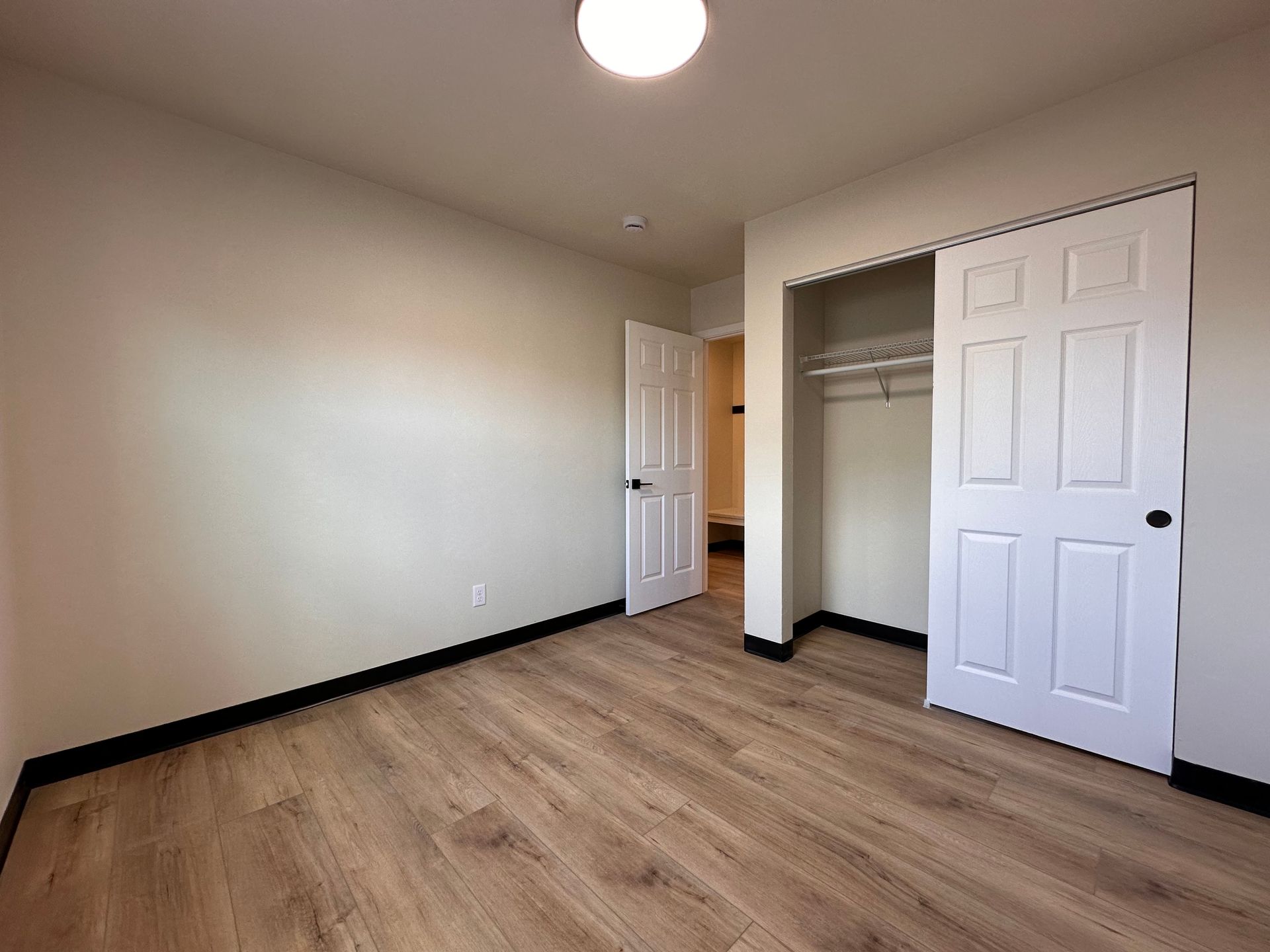 bedroom with sliding door closet