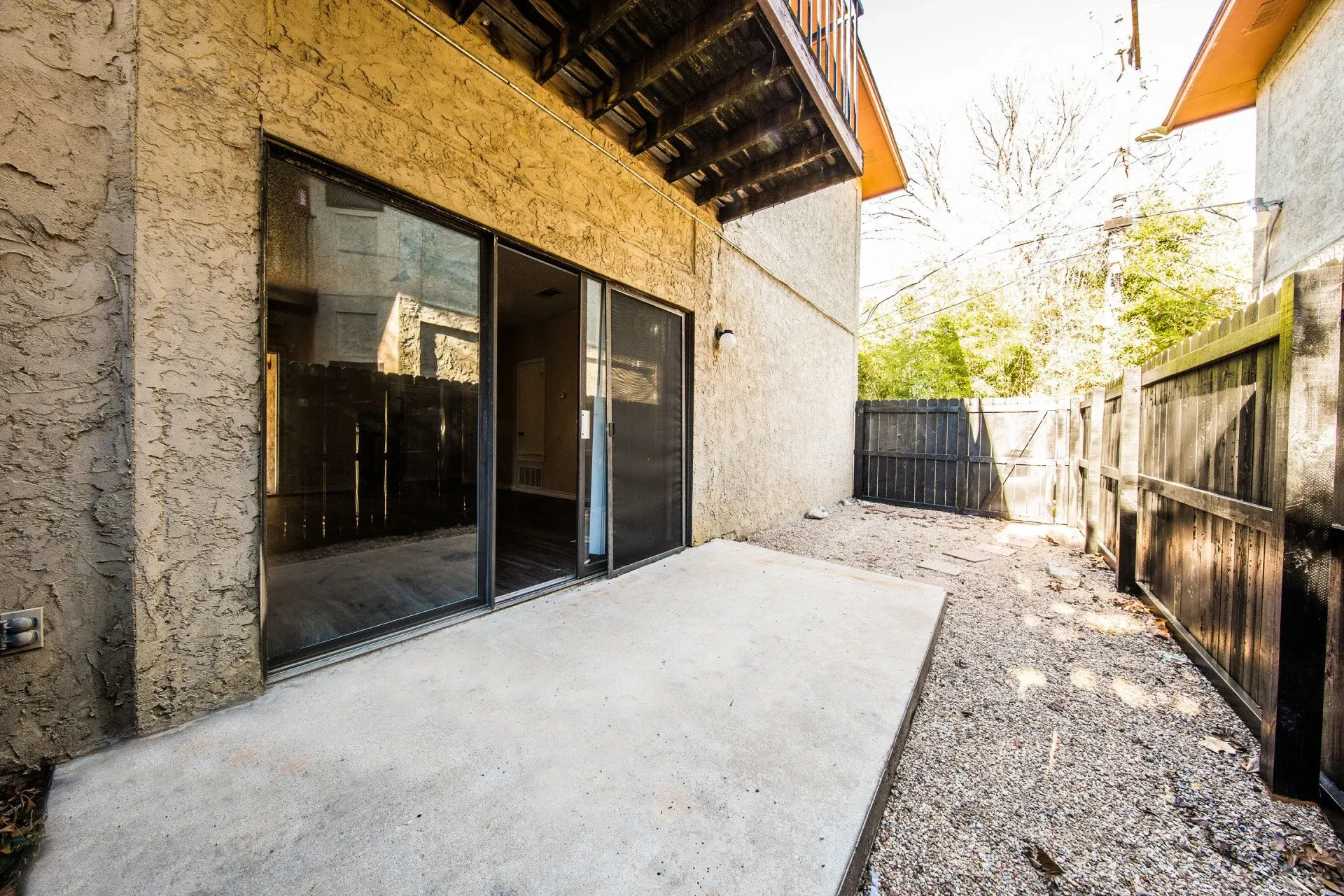 Three Villas - exterior of building and back patio